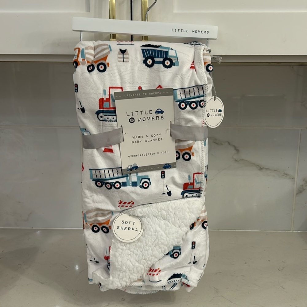 Brand new SHERPA stroller baby blanket. 
Warm and Cozy. CONSTRUCTION theme!